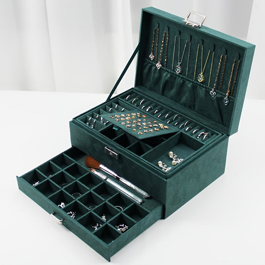 Deep green velvet jewelry box with drawers open
